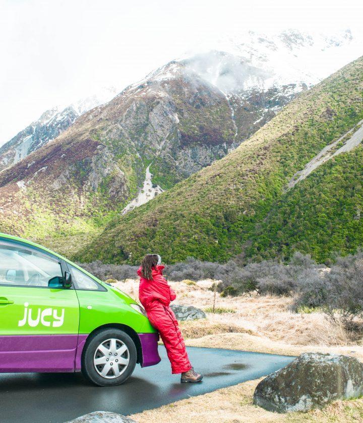 Jucy rentals Tasman Glacier New Zealand girl in Aldi sleeping bag