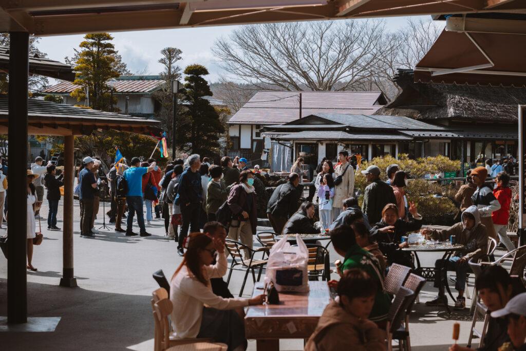 Iyashinosato Historic Village crowds during cherry blossom season