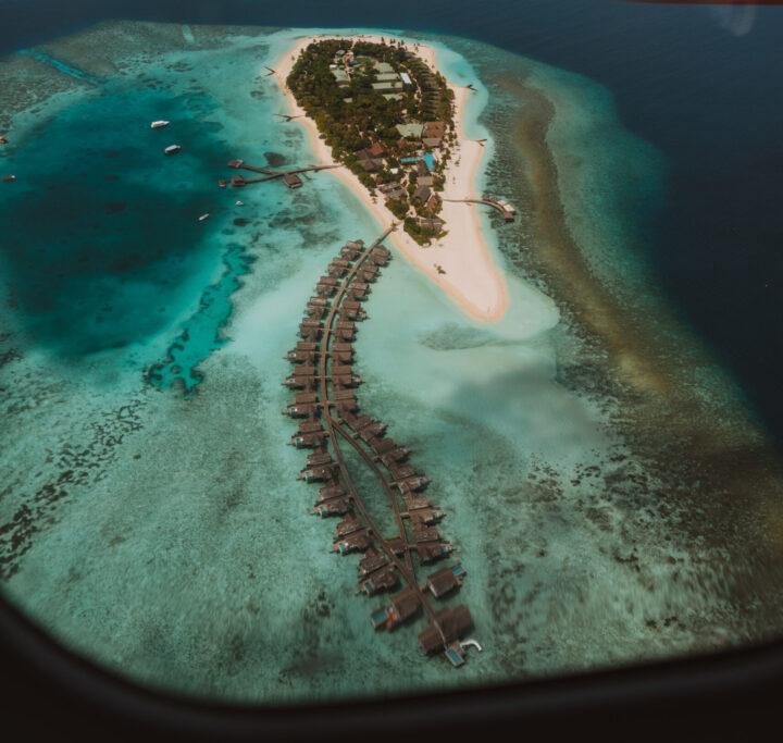 Seaplane view flying into Cora Cora Maldives. The best resort in the Raa Atoll