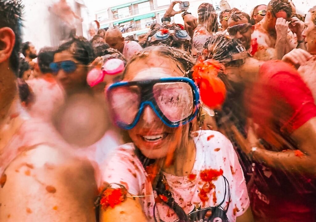 GoPro HERO vs GoPro MAX 2 review - GoPro selfie from La Tomatina, girl getting hit in the face by tomato